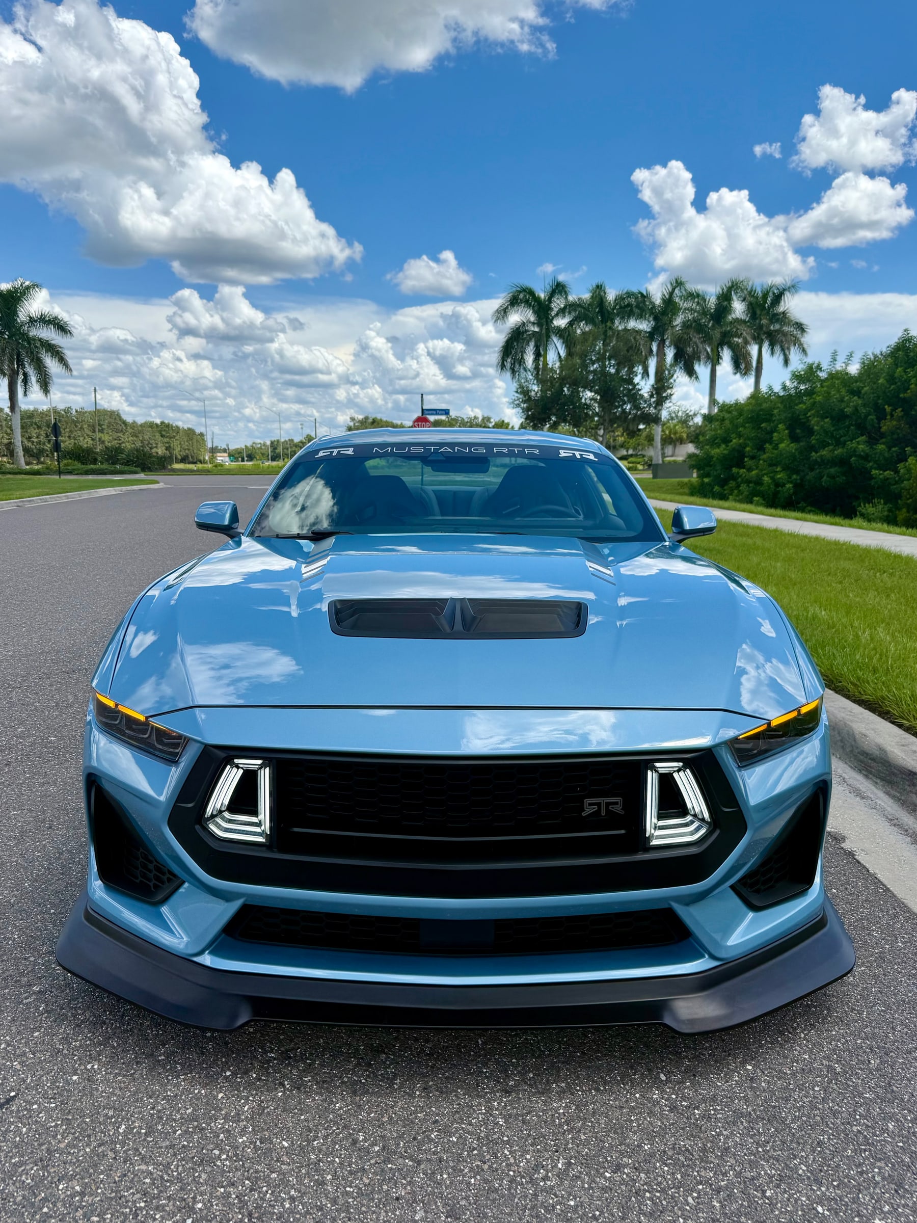 a flash of amber view of the Brittany Blue Mustang RTR Spec 3
