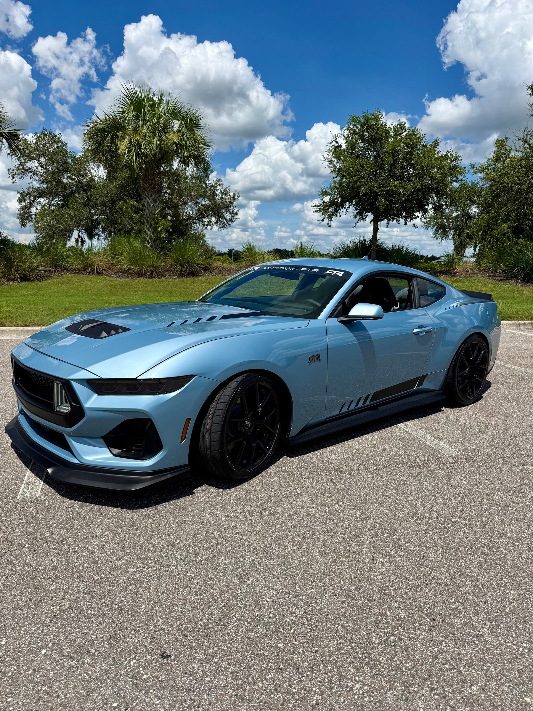 the spec 3 stance view of the Brittany Blue Mustang RTR Spec 3