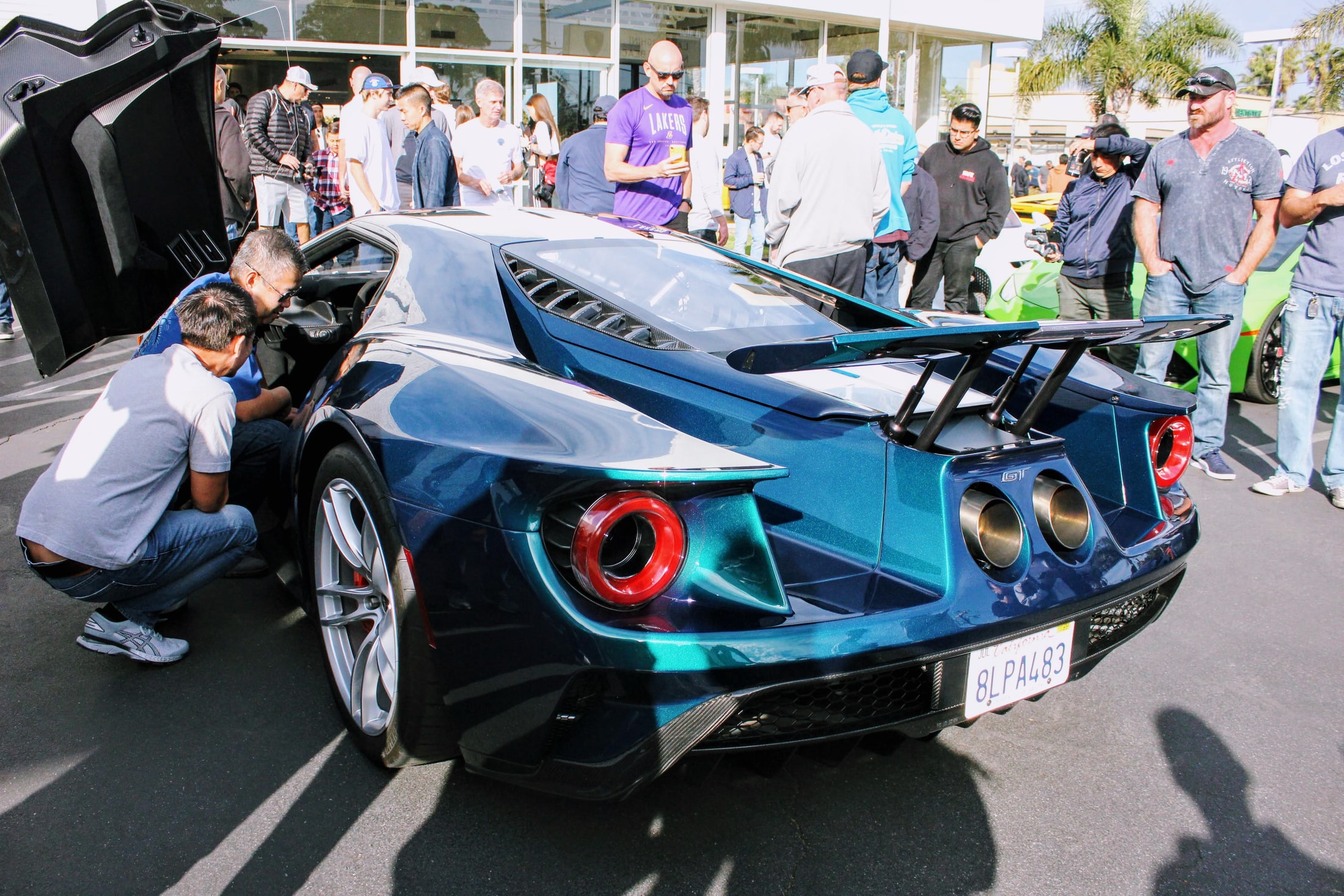 Rear three-quarter view of the Mystichrome Ford GT showing turquoise paint